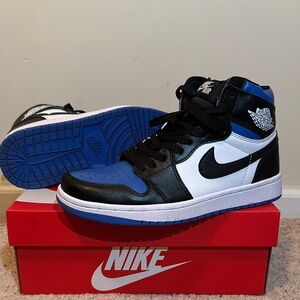Nike Black and Blue Sneakers with Iconic Design